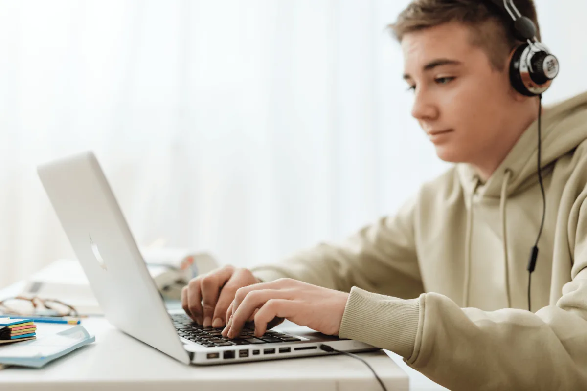 A student preparing for an admissions test online at a laptop