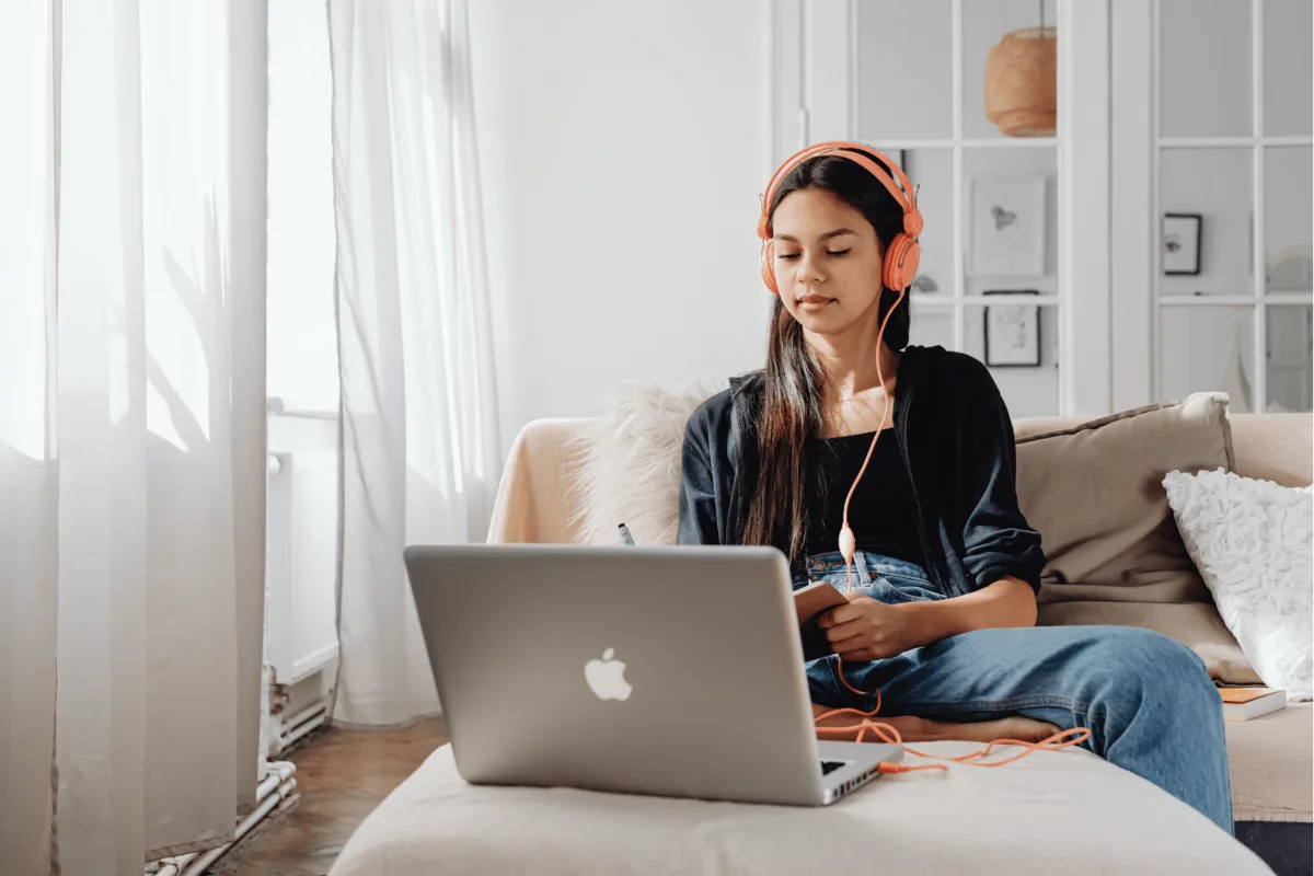 A CBSE student in a focused 1-on-1 online lesson at a laptop