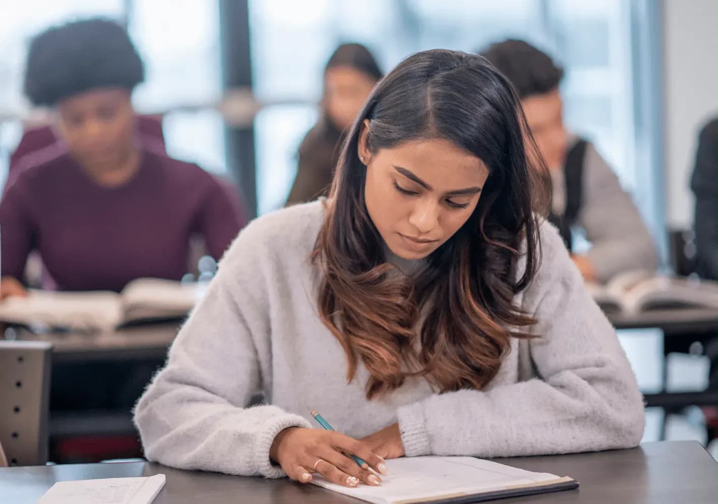 A student focused on admissions-test preparation